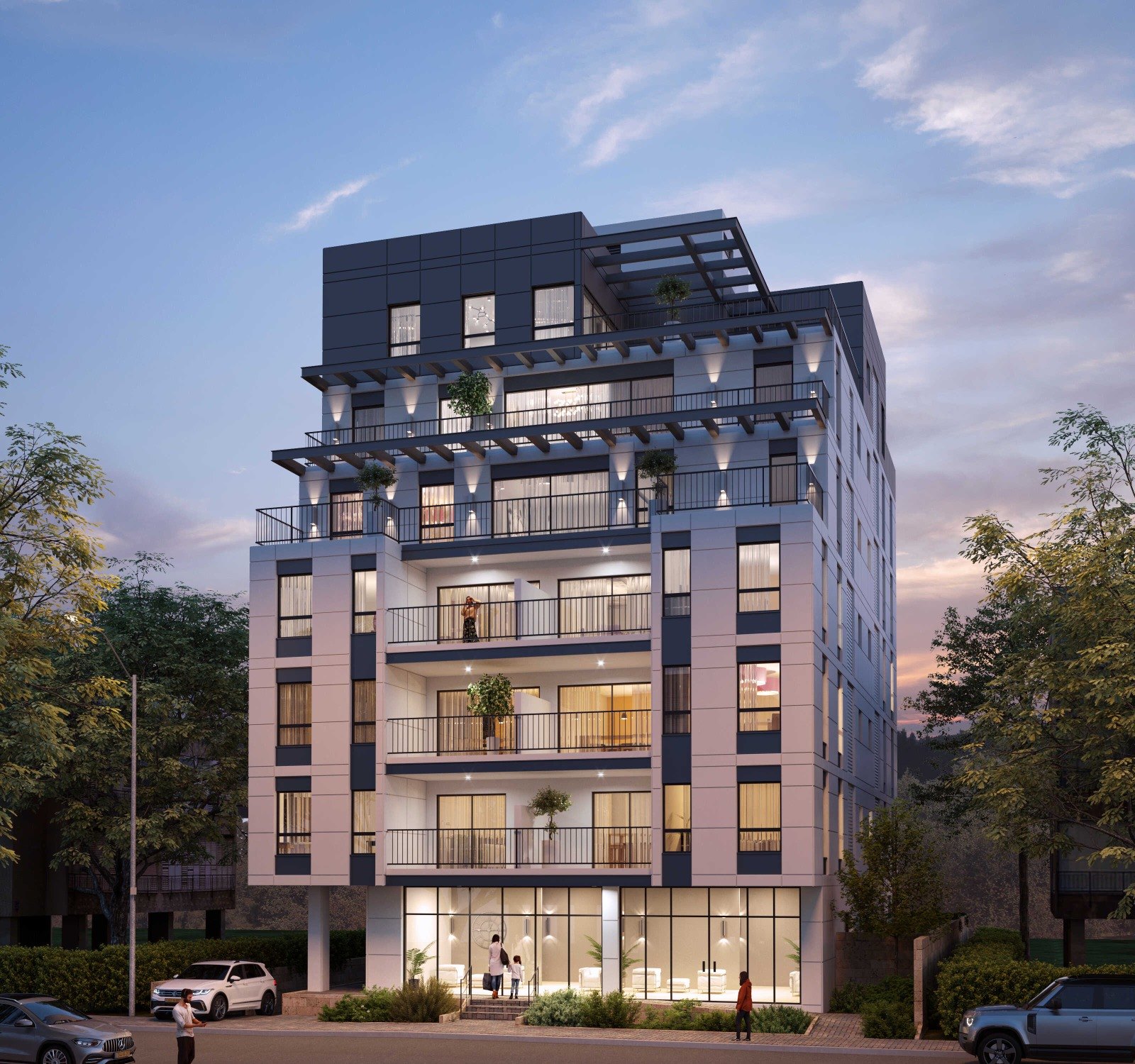 Immeuble neuf de standing rue Zemenhoff à Holon, façade et balcons au crépuscule, appartements 3 pièces